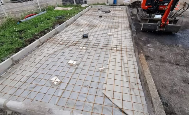 Création d'une dalle béton carrossable avec pose d'une fosse hydrocarbure à Roche la Molière, Saint-Just-Saint-Rambert, Mon extérieur
